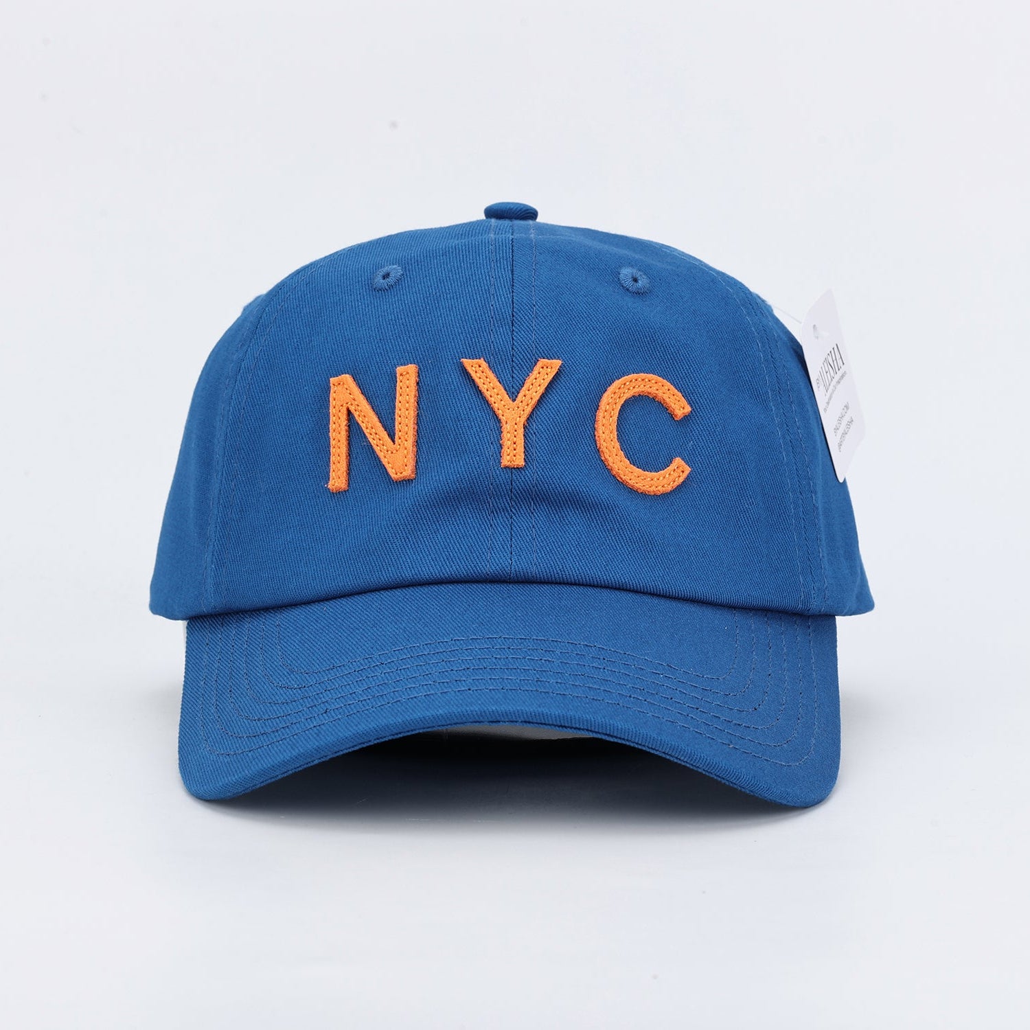 Blue Dad hat with bright orange felt letters