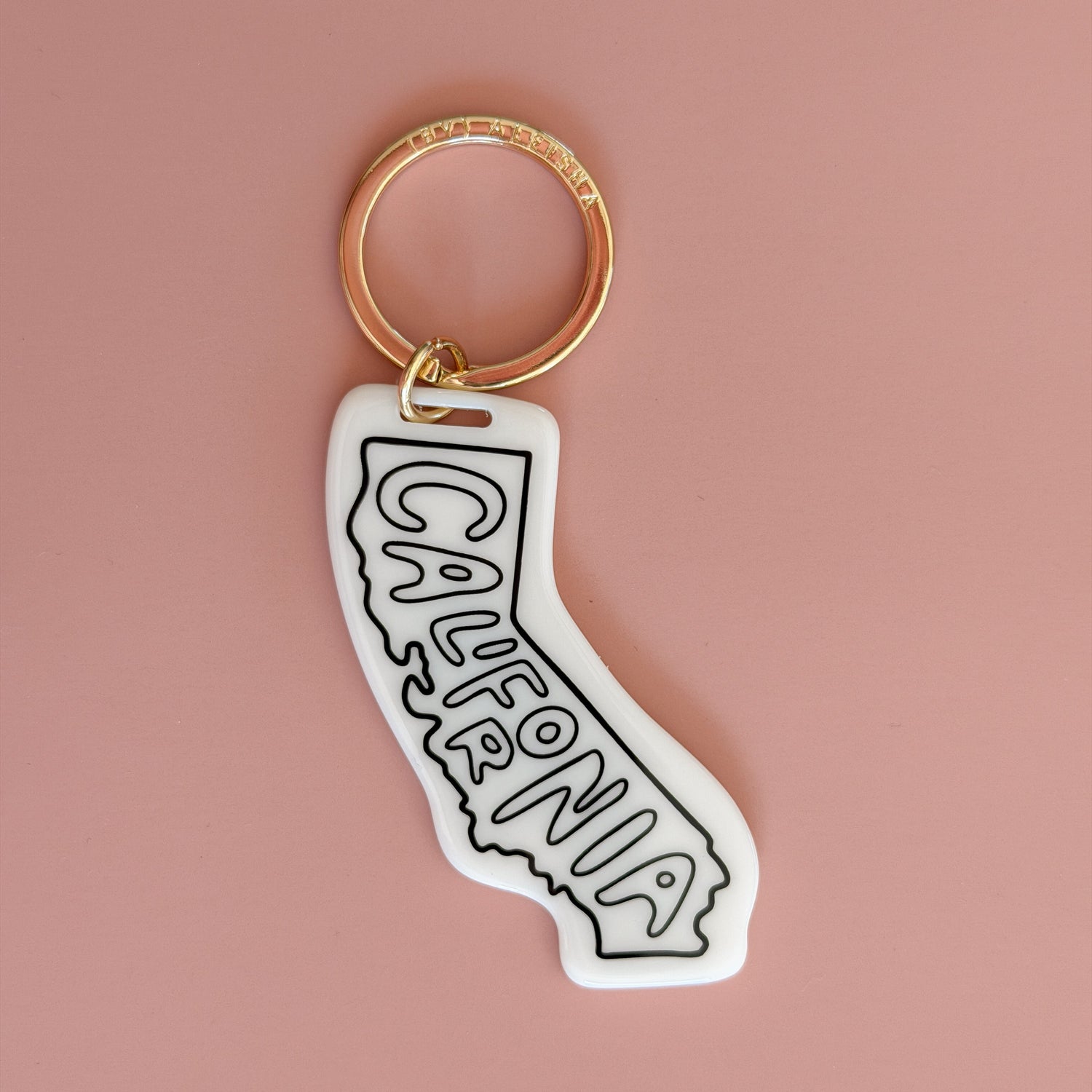 California state keychain with cream acrylic charm and gold engraved keyring