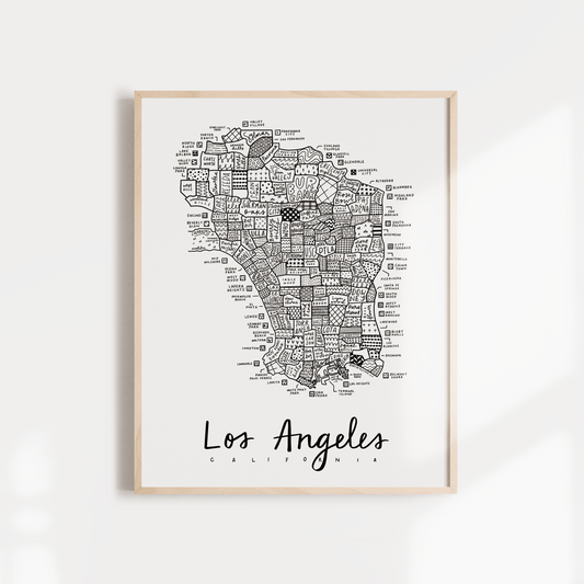 Black and white map print of Los Angeles, California, framed and labeled at the bottom.