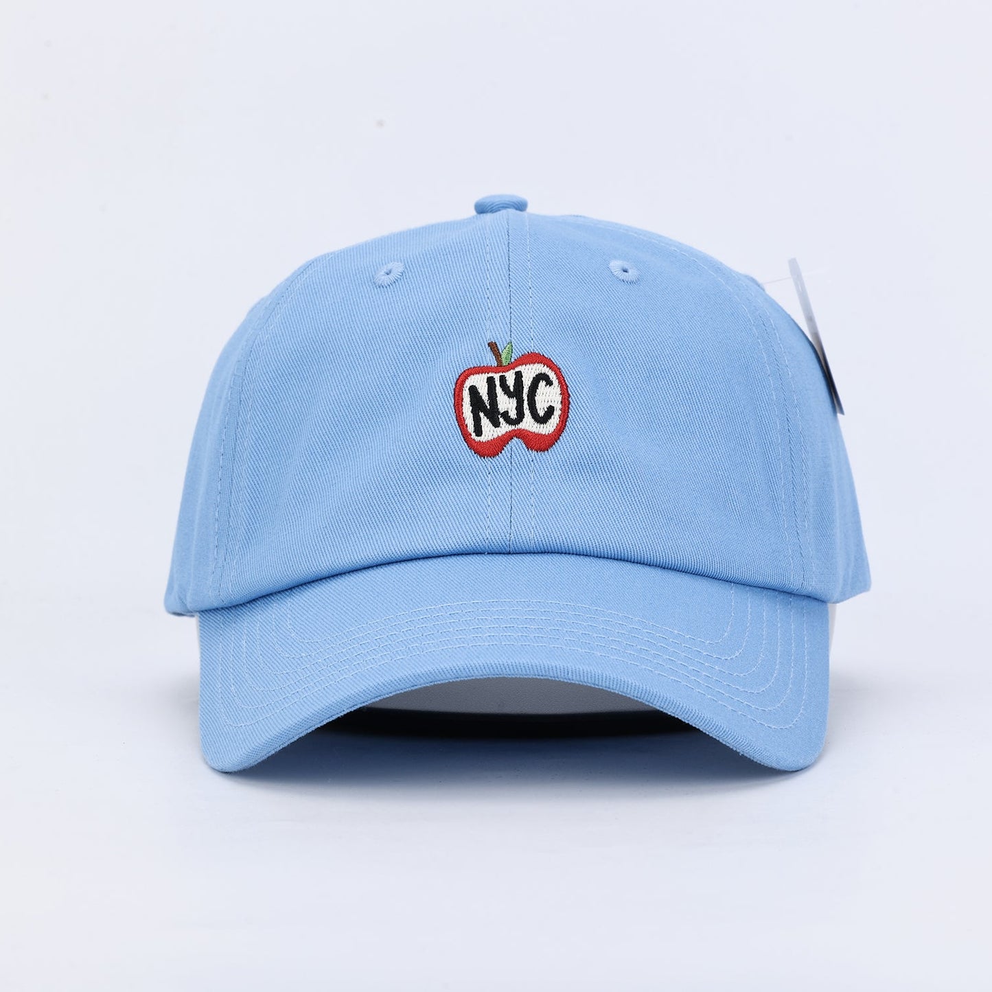 Light blue dad hat with an apple embroidered on the front 
